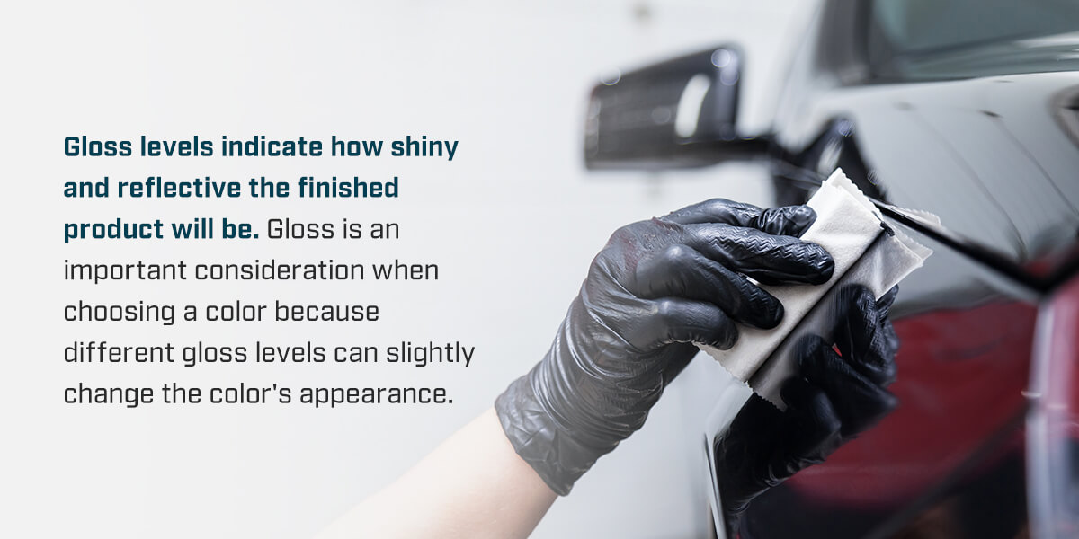 a person polishes a glossy powder coated surfaces