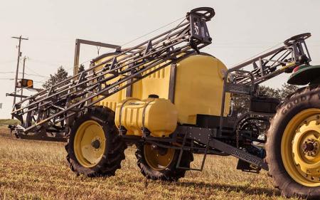 yellow crop care tractor