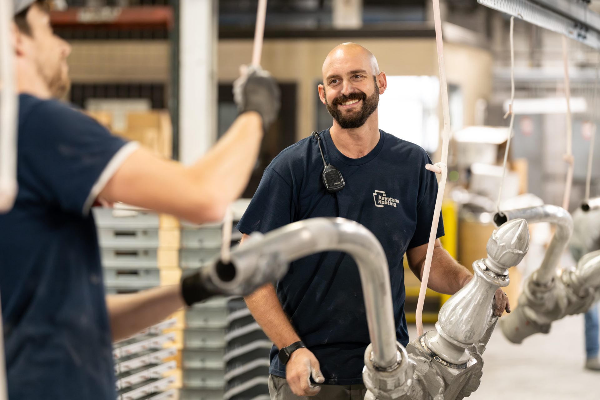 Keystone Koating employees inspecting quality of product through assembly