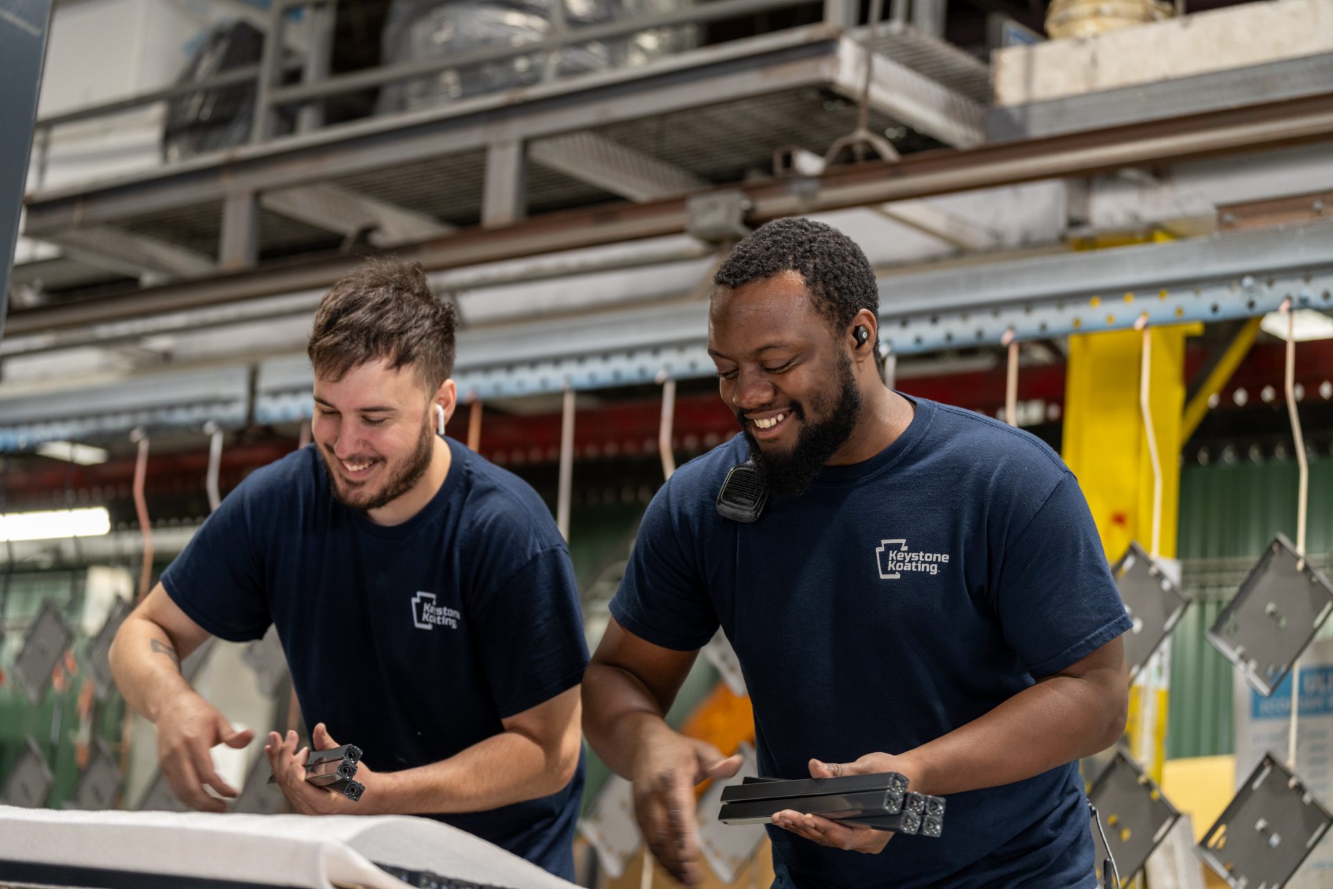 Keystone Koating employees collecting parts to assemble products